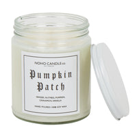 An 8oz short Pumpkin Patch candle.  The wax is white, the jar is clear, and the lid is white and screws on.